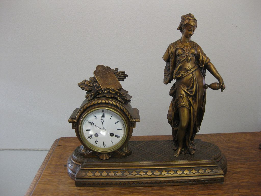 French Statue Mantel Clock French Statue Mantel Clock