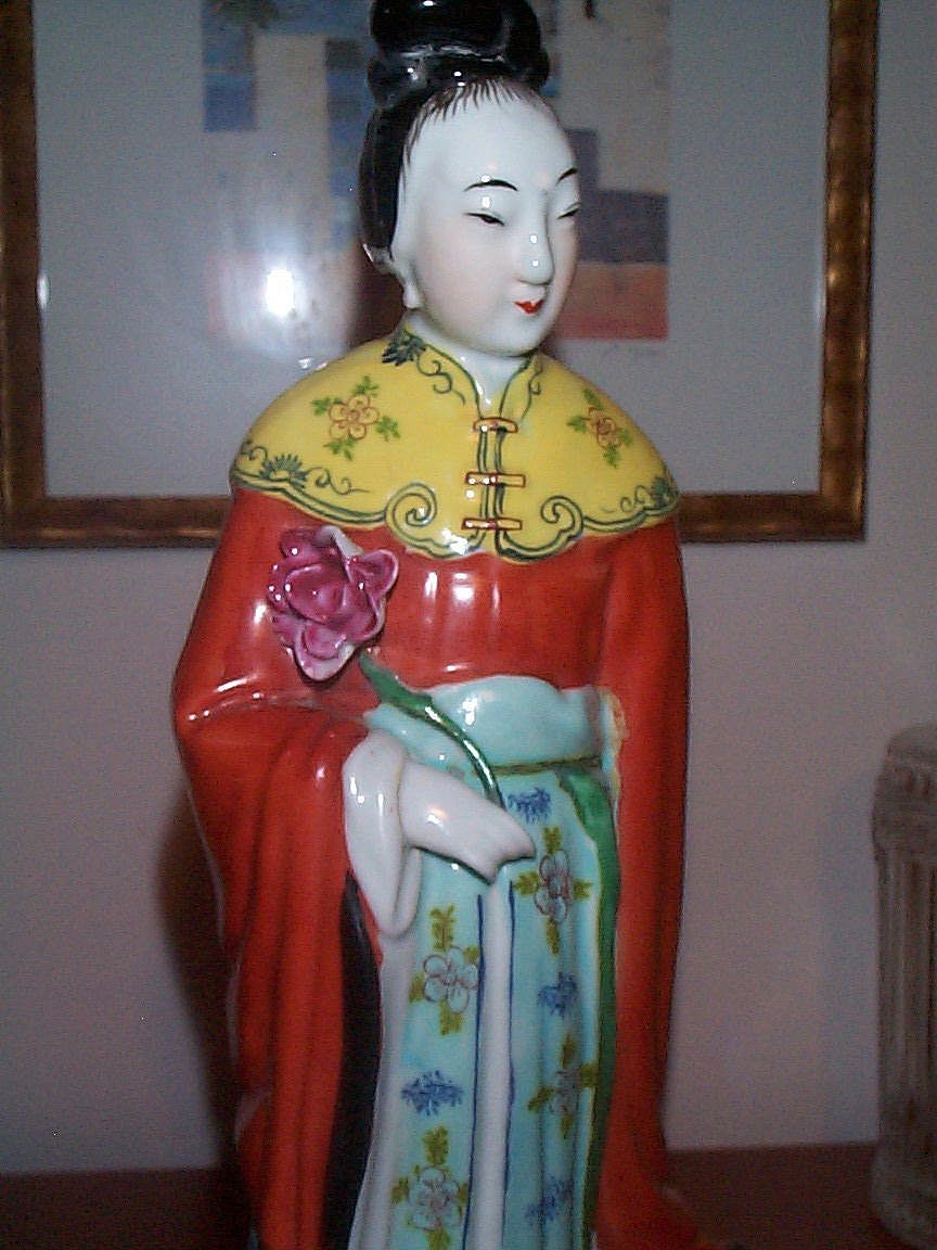 Tall 19C/Early 20th Century Chinese Figurine Holding Lotus Flower Tall 19C/Early 20th Century Chinese Figurine Holding Lotus Flower