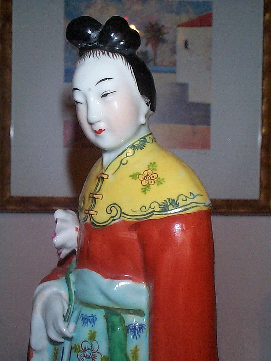 Tall 19C/Early 20th Century Chinese Figurine Holding Lotus Flower Tall 19C/Early 20th Century Chinese Figurine Holding Lotus Flower