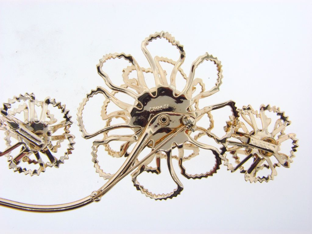 Signed Sarah Coventry brooch and ear clips from the Allusion Line Signed Sarah Coventry brooch and ear clips from the Allusion Line