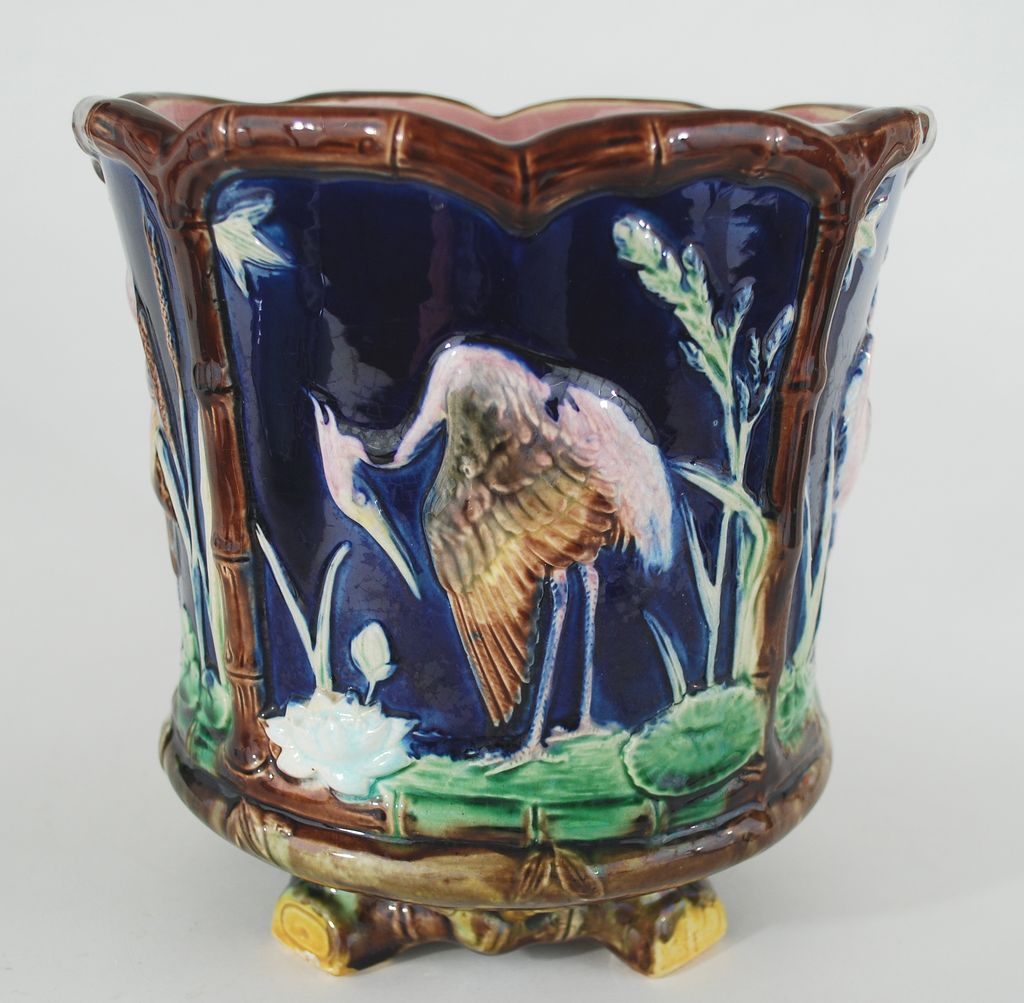 Antique Majolica Jardiniere Paneled with Stork Motif Antique Majolica Jardiniere Paneled with Stork Motif