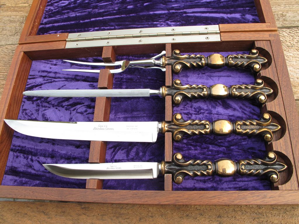 Case XX Stainless Steel Carving Set With Walnut Case 2 Knives, Serving Fork and Sharpening Steel. Case XX Stainless Steel Carving Set With Walnut Case 2 Knives, Serving Fork and Sharpening Steel.