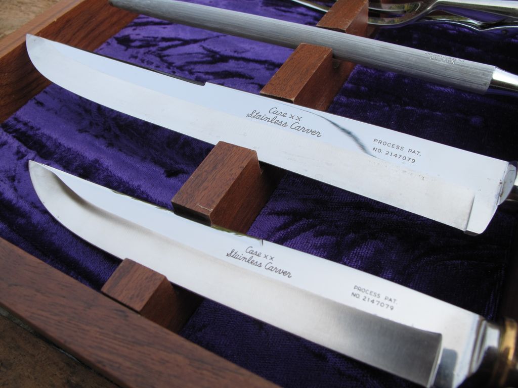 Case XX Stainless Steel Carving Set With Walnut Case 2 Knives, Serving Fork and Sharpening Steel. Case XX Stainless Steel Carving Set With Walnut Case 2 Knives, Serving Fork and Sharpening Steel.