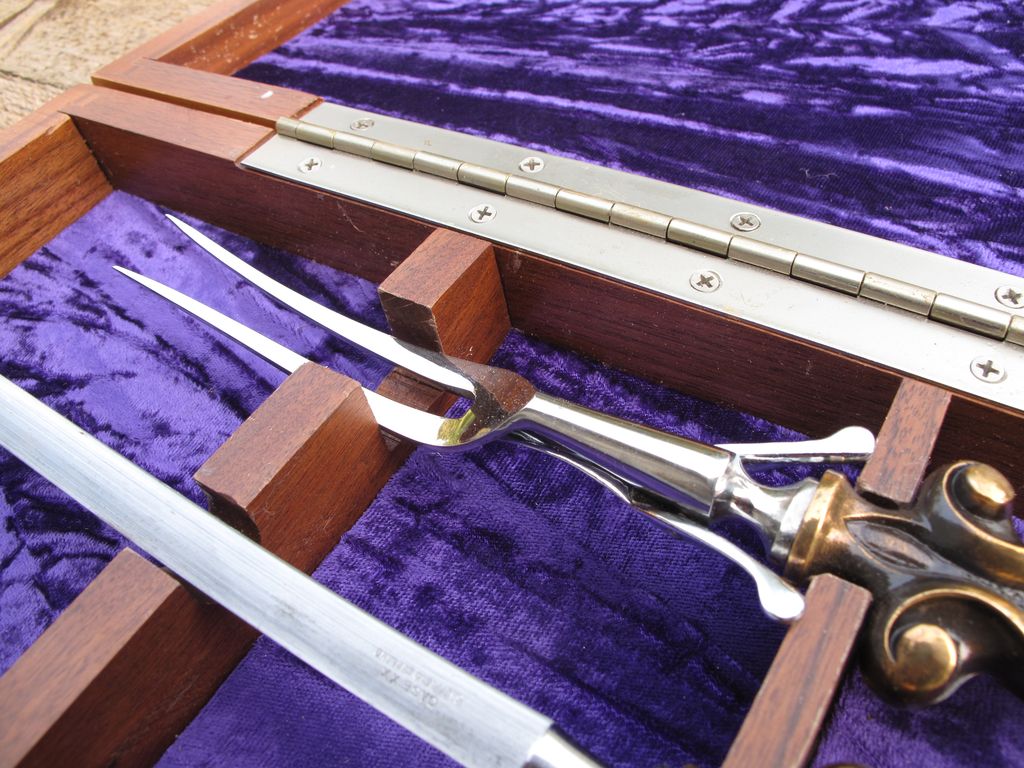 Case XX Stainless Steel Carving Set With Walnut Case 2 Knives, Serving Fork and Sharpening Steel. Case XX Stainless Steel Carving Set With Walnut Case 2 Knives, Serving Fork and Sharpening Steel.