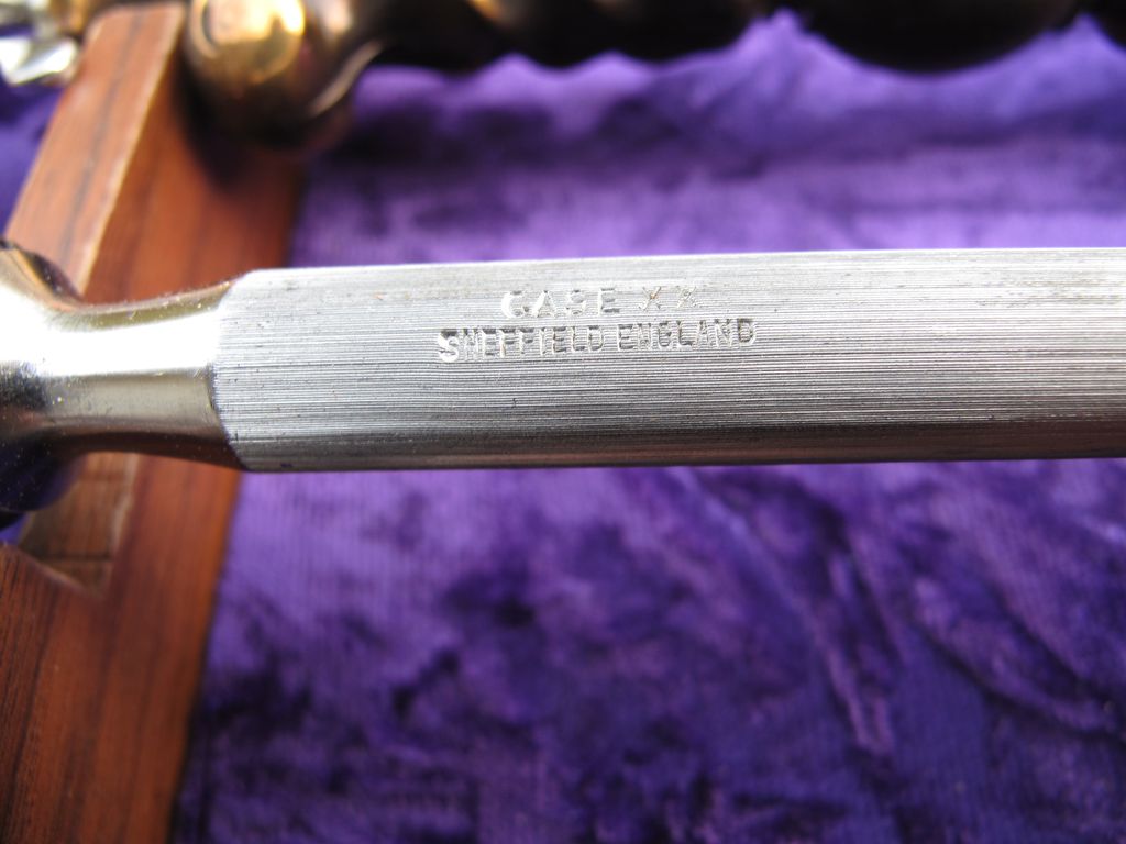 Case XX Stainless Steel Carving Set With Walnut Case 2 Knives, Serving Fork and Sharpening Steel. Case XX Stainless Steel Carving Set With Walnut Case 2 Knives, Serving Fork and Sharpening Steel.