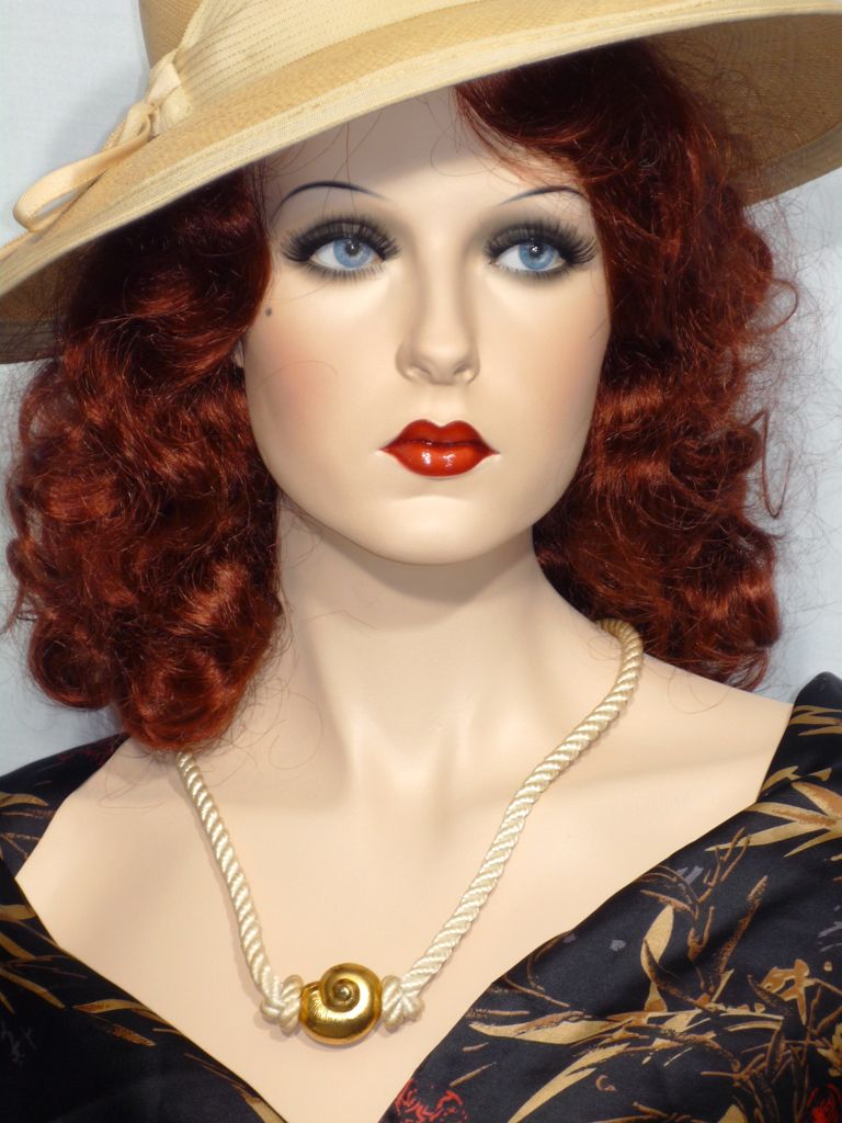 Vintage 1970s Yves Saint Laurent Gold Tone Shell Pendant On Cord Vintage 1970s Yves Saint Laurent Gold Tone Shell Pendant On Cord