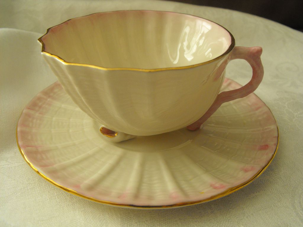 Belleek Shell Cup and Saucer with shell feet and twig handle from the '90s Belleek Shell Cup and Saucer with shell feet and twig handle from the '90s