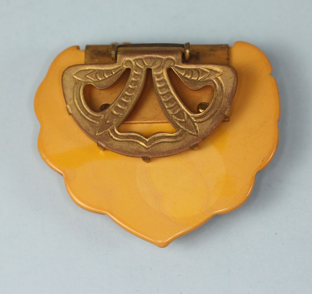 Vintage Pumpkin Orange Bakelite Brooch and Dress Clip Set Metal Overlay Vintage Pumpkin Orange Bakelite Brooch and Dress Clip Set Metal Overlay