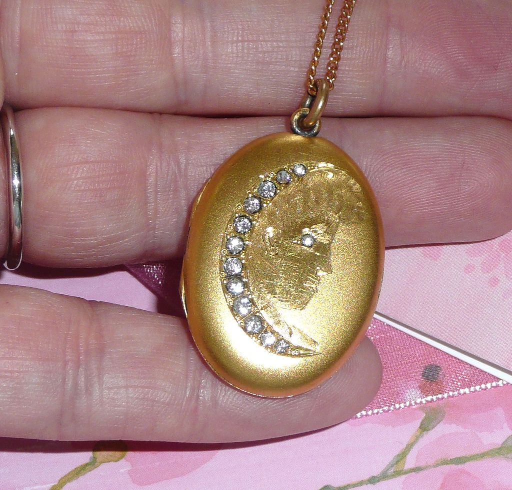 Girl's Face with Crescent Moon Locket Girl's Face with Crescent Moon Locket