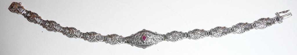 Vintage Sterling Filigree Bracelet with Ruby Vintage Sterling Filigree Bracelet with Ruby