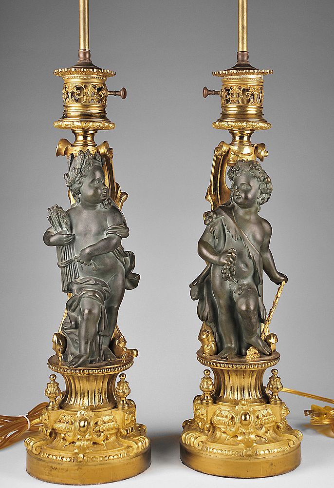 Pair of Patinated and Gilt Bronze French Figural Lamps Pair of Patinated and Gilt Bronze French Figural Lamps