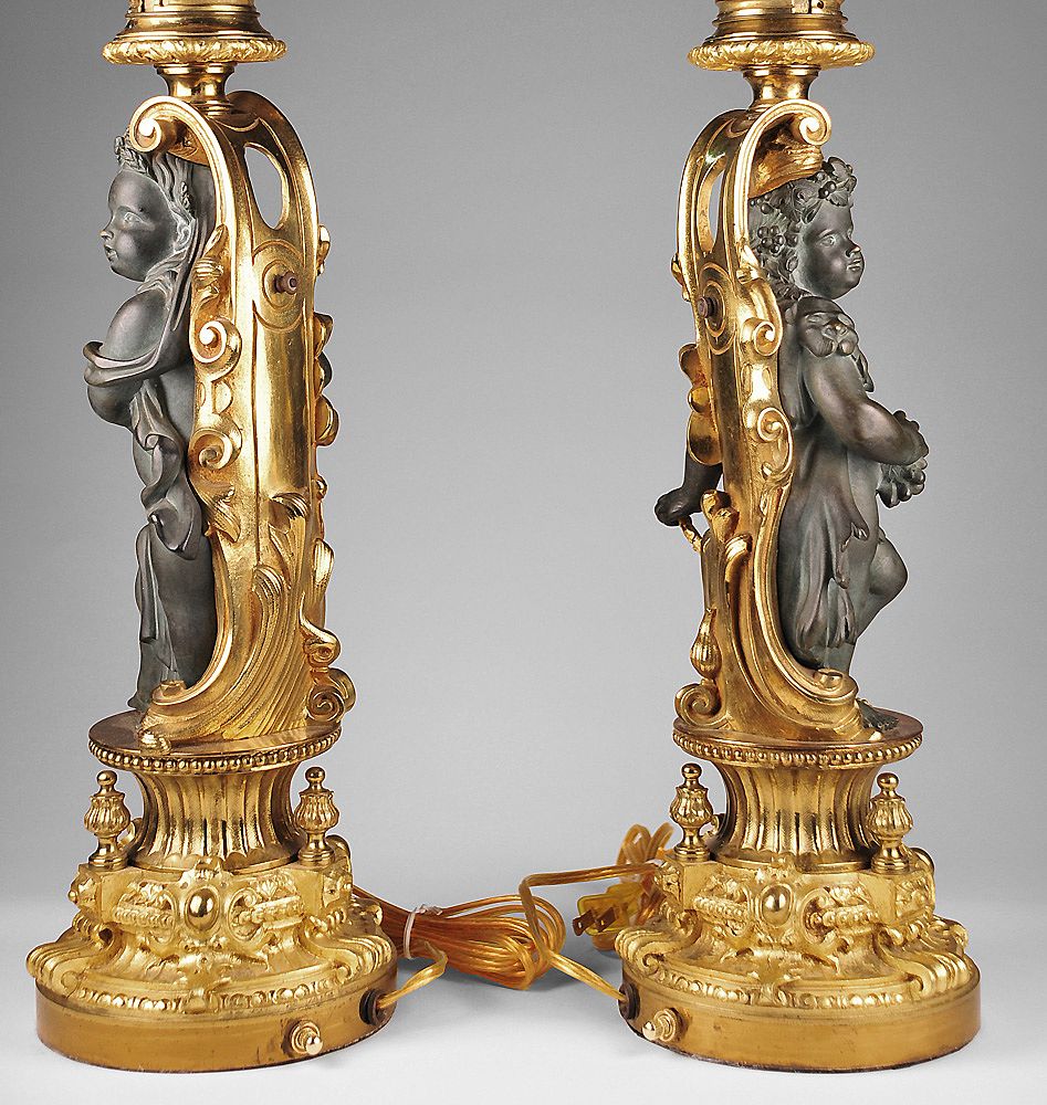 Pair of Patinated and Gilt Bronze French Figural Lamps Pair of Patinated and Gilt Bronze French Figural Lamps