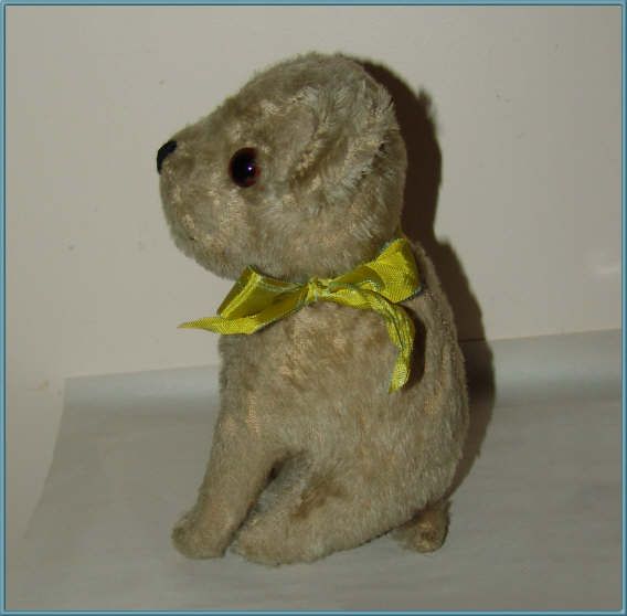 Vintage Toy Mohair Dog, straw stuffed, glass eyes. Vintage Toy Mohair Dog, straw stuffed, glass eyes.