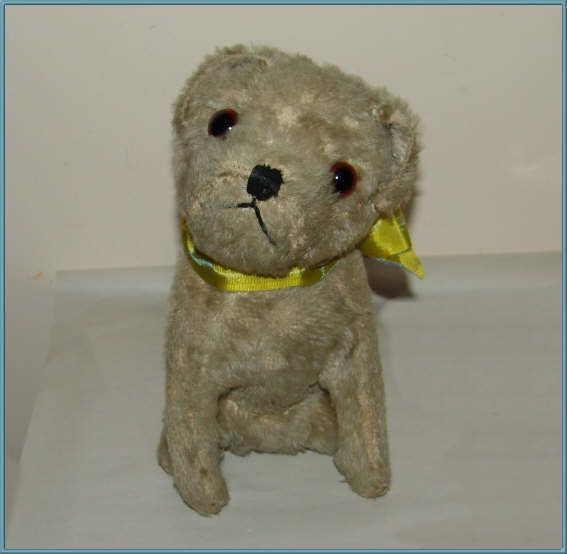 Vintage Toy Mohair Dog, straw stuffed, glass eyes. Vintage Toy Mohair Dog, straw stuffed, glass eyes.