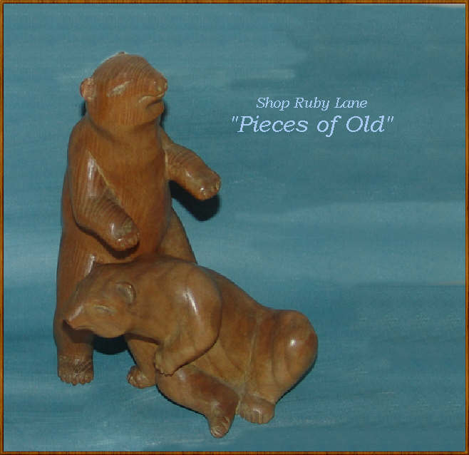 Pair of Carved Wood Bear Sculptures by Charles H. Rudy Pair of Carved Wood Bear Sculptures by Charles H. Rudy