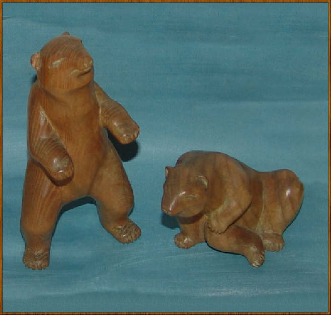 Pair of Carved Wood Bear Sculptures by Charles H. Rudy Pair of Carved Wood Bear Sculptures by Charles H. Rudy