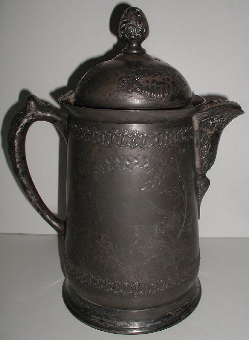 Antique Pairpoint Quadruple Silverplate Ice Water Pitcher Hinged Lid Ornate Floral Etched & Embossed Screw Cap On Bottom 12.75" Tall Enamel Liner Antique Pairpoint Quadruple Silverplate Ice Water Pitcher Hinged Lid Ornate Floral Etched & Embossed Screw Cap On Bottom 12.75" Tall Enamel Liner
