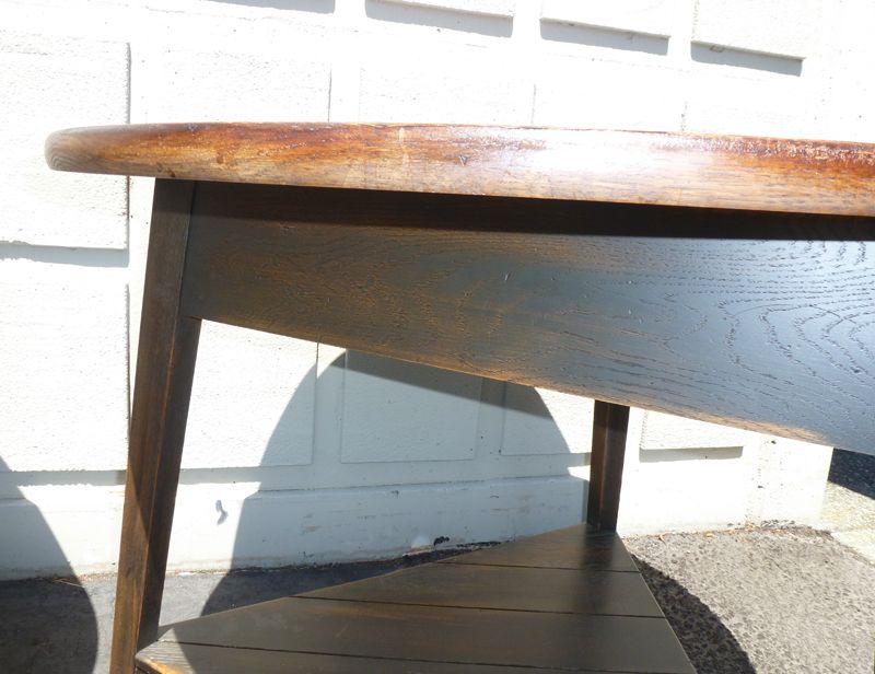 Pair of oak circular plank tables Pair of oak circular plank tables