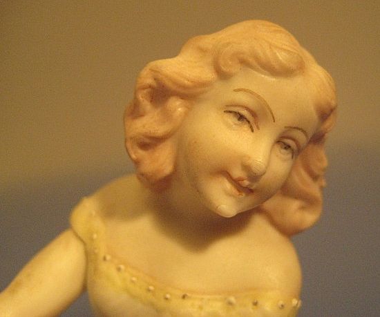 Bisque Piano Doll, Pretty Teen-ager Fixing Stockings - Edwardian Bisque Piano Doll, Pretty Teen-ager Fixing Stockings - Edwardian
