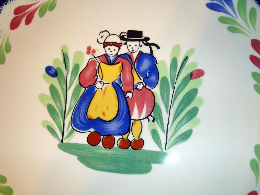 Pair of French faience earthenware plates made by Pornic Pair of French faience earthenware plates made by Pornic