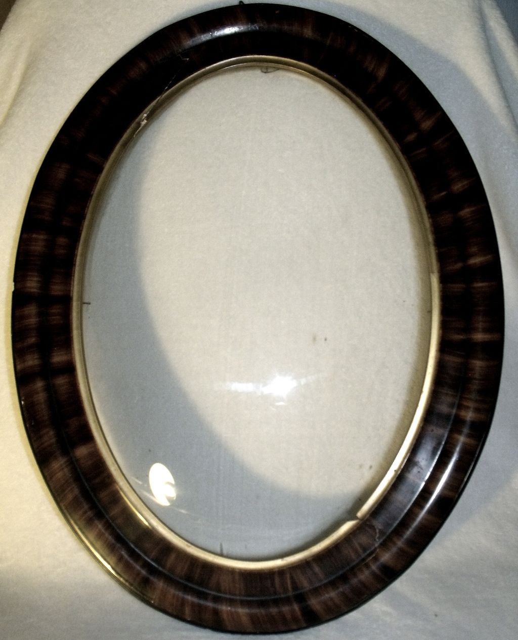 oval wooden frame