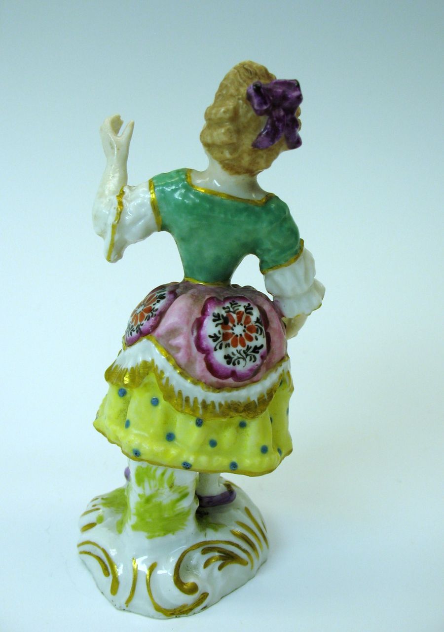 Fine early porcelain cabinet figure of a Lady with early Derby mark Fine early porcelain cabinet figure of a Lady with early Derby mark
