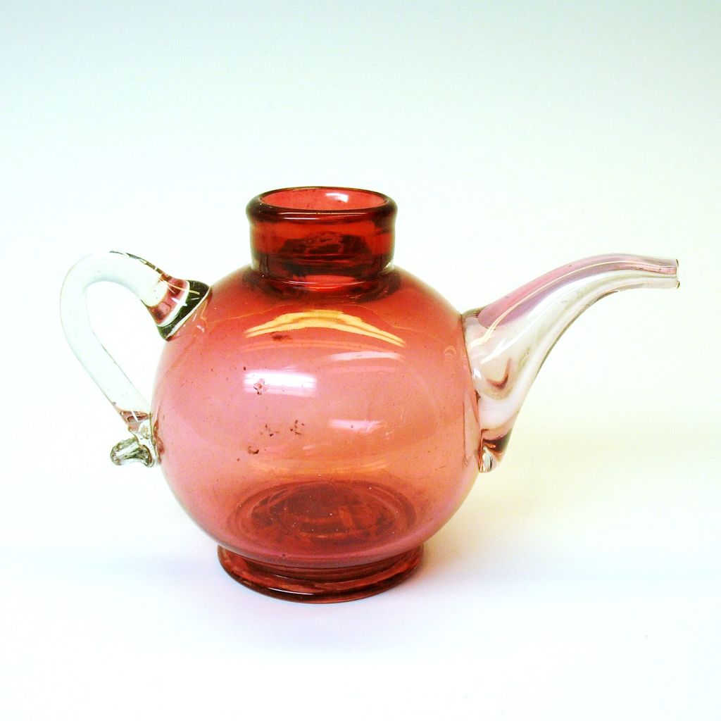 Rare cranberry glass tea pot formed baby feeder bottle Rare cranberry glass tea pot formed baby feeder bottle