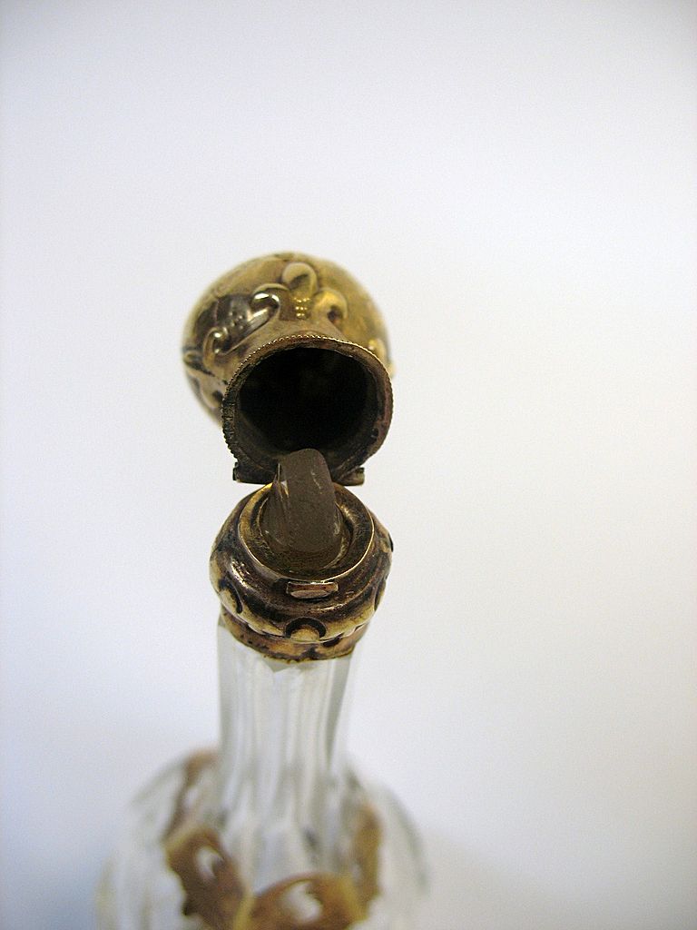 Antique gold and crystal glass perfume bottle Antique gold and crystal glass perfume bottle