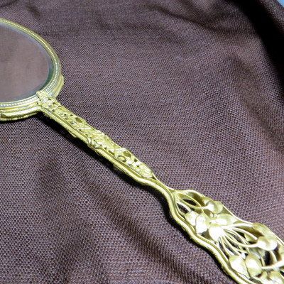 Vintage signed Apollo luxury hand mirror ormolu frame pierced floral handle Vintage signed Apollo luxury hand mirror ormolu frame pierced floral handle