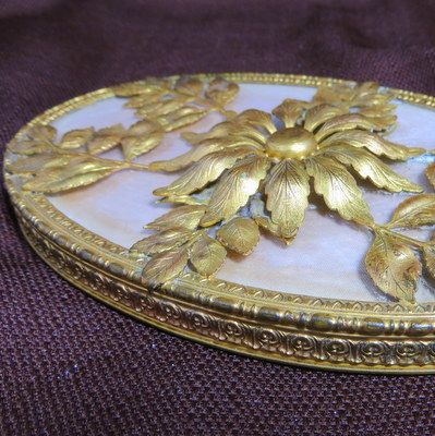Vintage signed Apollo luxury hand mirror ormolu frame pierced floral handle Vintage signed Apollo luxury hand mirror ormolu frame pierced floral handle