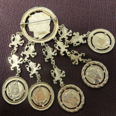 Vintage Monet jewelry royal lions cameo profile coins 4 inch swag brooch Vintage Monet jewelry royal lions cameo profile coins 4 inch swag brooch