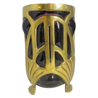 Vintage Amethyst glass vase encased in geometric design brass frame Vintage Amethyst glass vase encased in geometric design brass frame