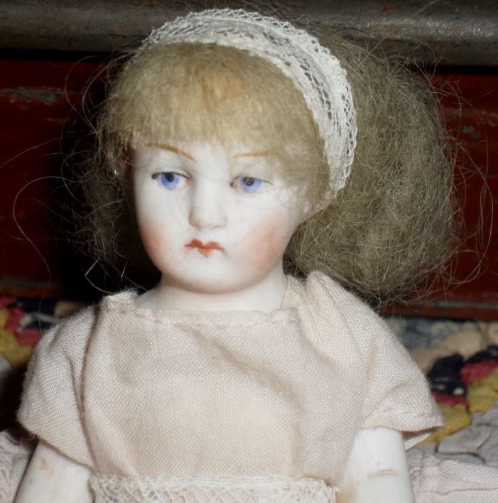 German All Bisque Doll with Pink Shoes German All Bisque Doll with Pink Shoes