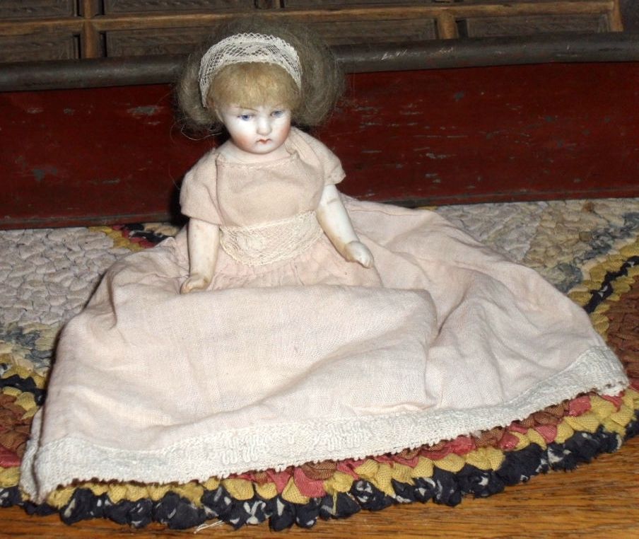 German All Bisque Doll with Pink Shoes German All Bisque Doll with Pink Shoes