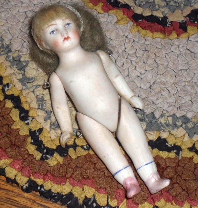 German All Bisque Doll with Pink Shoes German All Bisque Doll with Pink Shoes