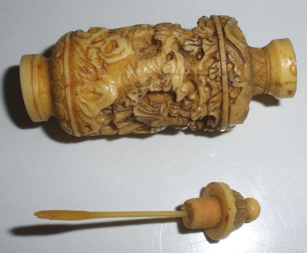 Asian Carved Ivory Snuff Bottle Asian Carved Ivory Snuff Bottle