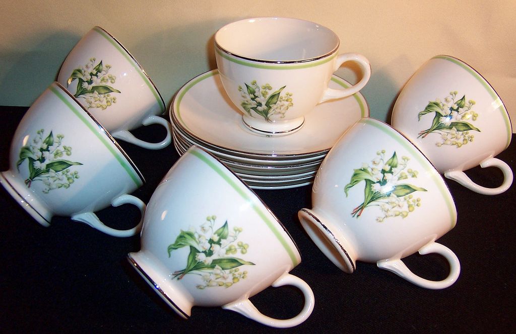 Homer Laughlin: Eggshell Nautilus: Lily of the Valley Footed Cups and Saucers Homer Laughlin: Eggshell Nautilus: Lily of the Valley Footed Cups and Saucers