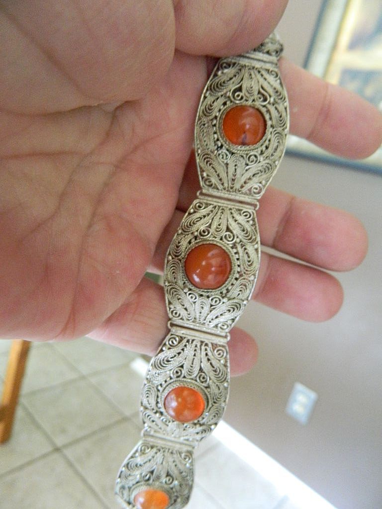 Intricate silver panel bracelet- Chinese with carnelian stones Intricate silver panel bracelet- Chinese with carnelian stones