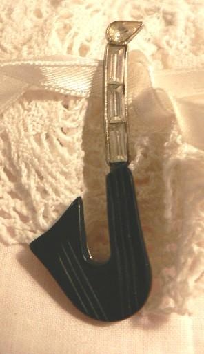 Vintage Art Deco Plastic & Rhinestone Instrument Saxophone Brooch Vintage Art Deco Plastic & Rhinestone Instrument Saxophone Brooch