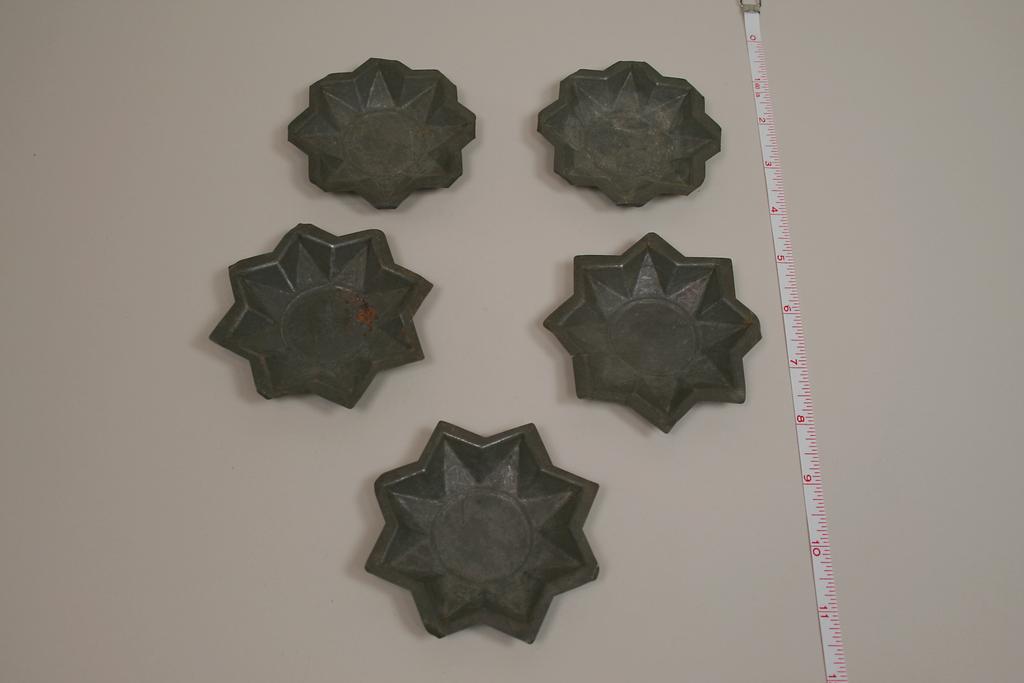 Five Early Dollhouse Molds Shaped Like Stars Five Early Dollhouse Molds Shaped Like Stars