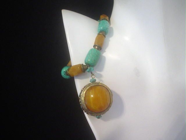 Tibetan Inlaid Copal, Turquoise and Jade Bracelet Tibetan Inlaid Copal, Turquoise and Jade Bracelet