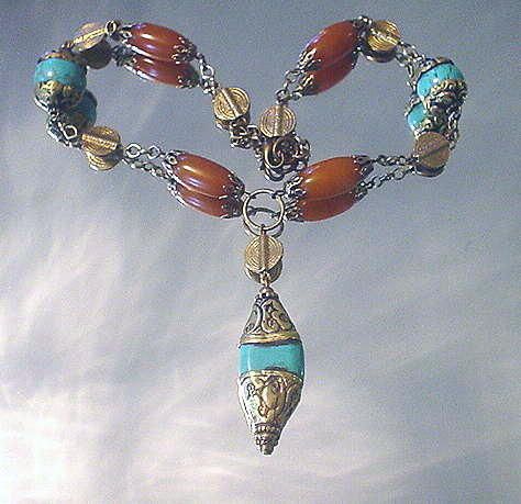 Tibetan Repousse Turquoise, Resin and Baoule Necklace Tibetan Repousse Turquoise, Resin and Baoule Necklace