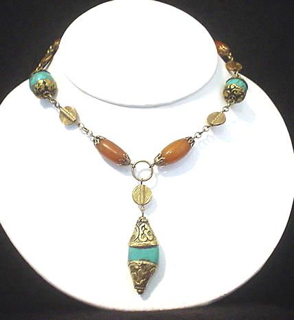 Tibetan Repousse Turquoise, Resin and Baoule Necklace Tibetan Repousse Turquoise, Resin and Baoule Necklace
