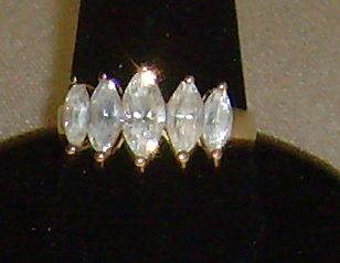 Cubic Zirconia and Gold-Toned Ring Cubic Zirconia and Gold-Toned Ring