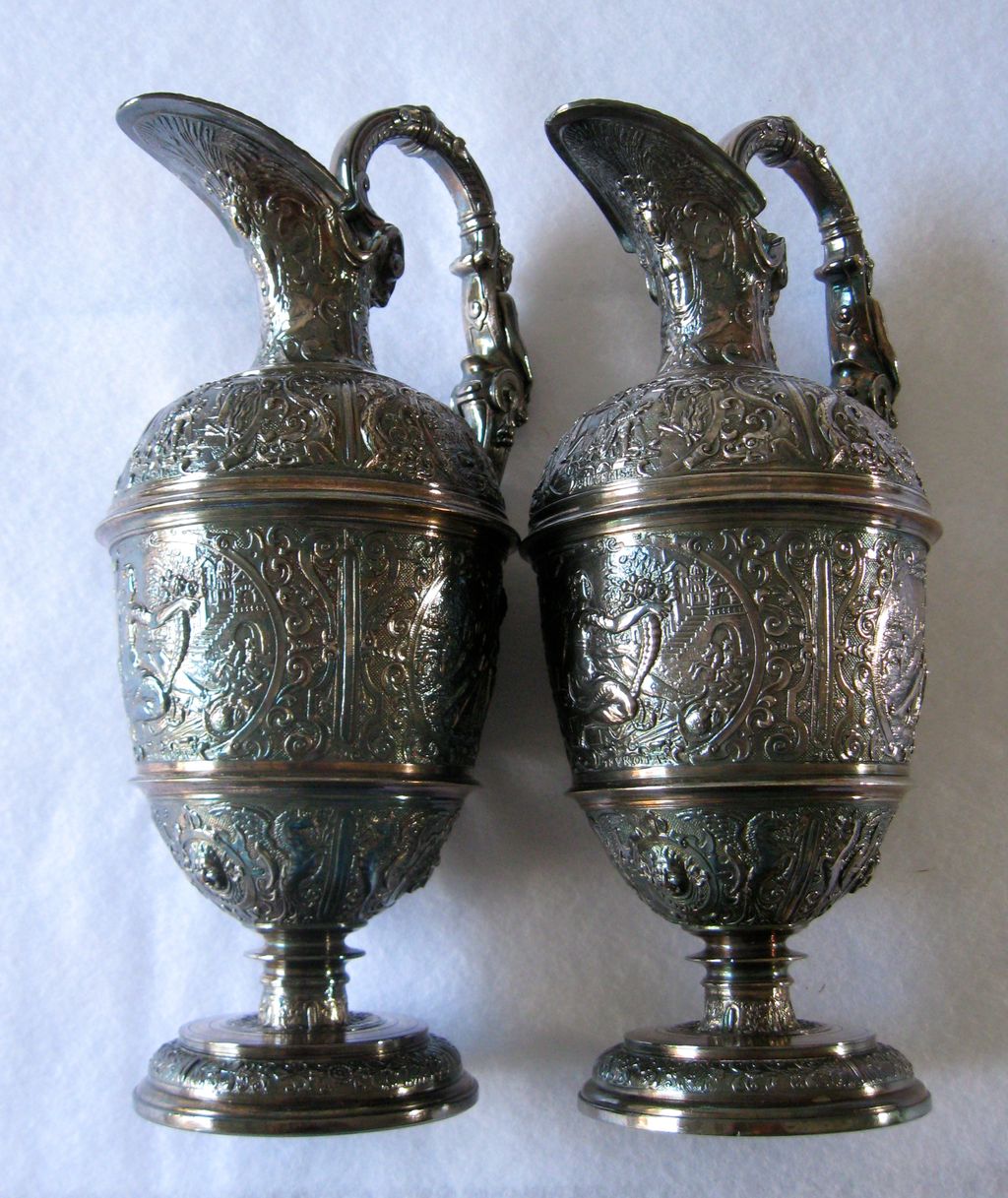 Antique Elkington highly embossed silver plate ewers, pair, 1850s Antique Elkington highly embossed silver plate ewers, pair, 1850s