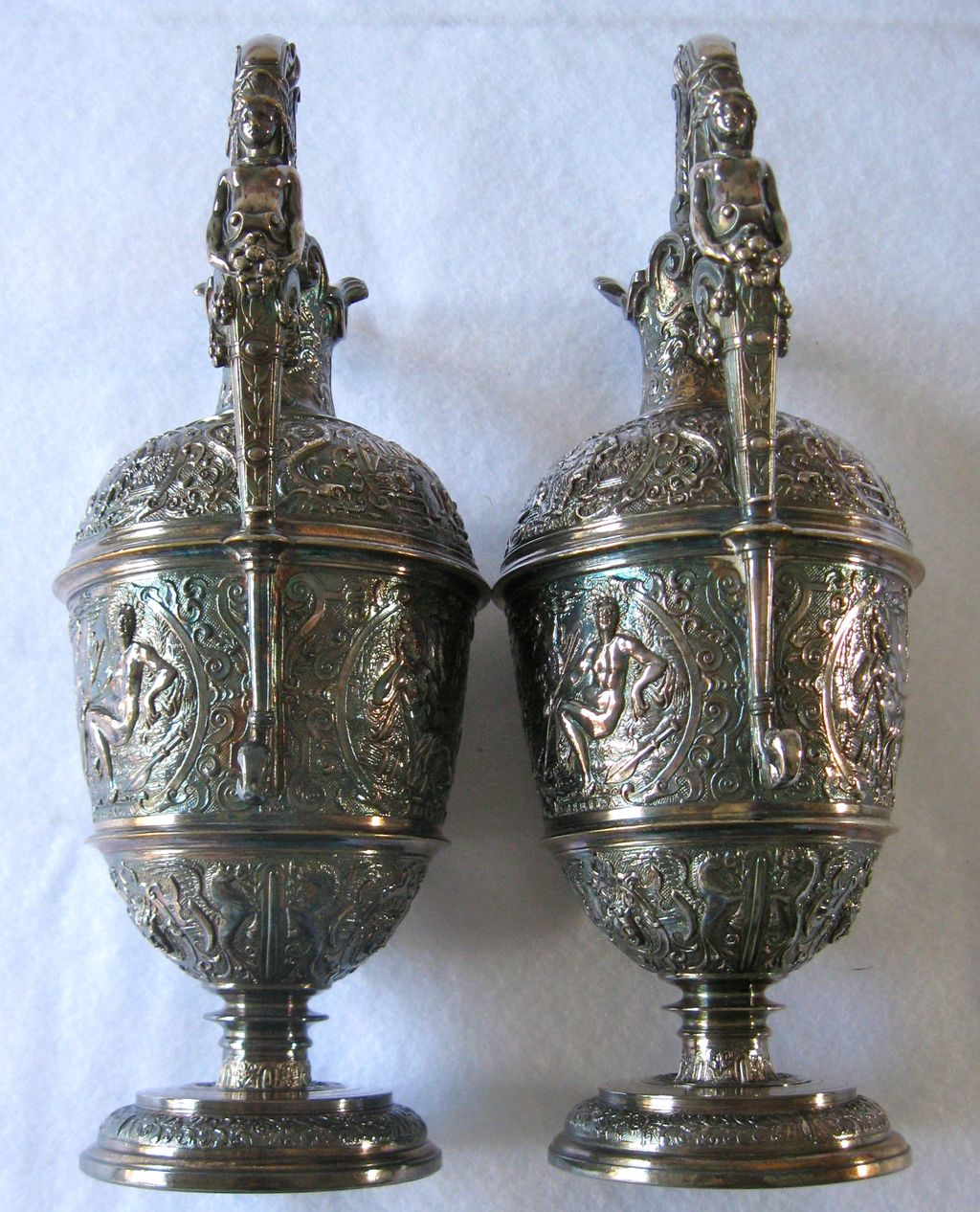 Antique Elkington highly embossed silver plate ewers, pair, 1850s Antique Elkington highly embossed silver plate ewers, pair, 1850s