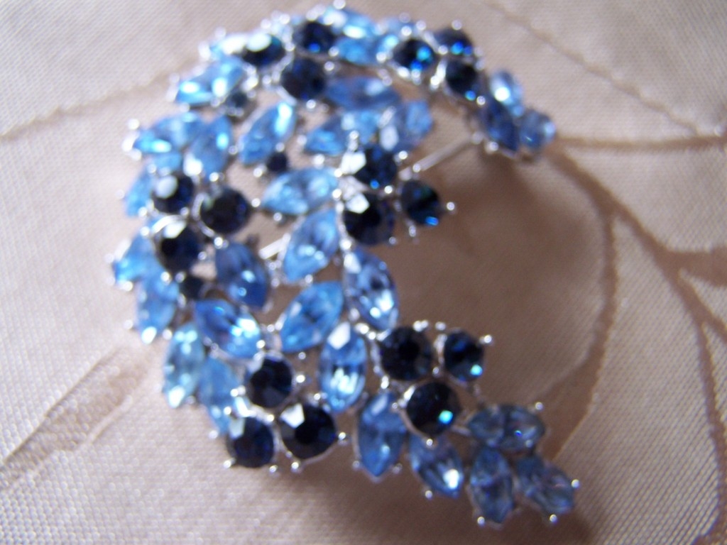 Signed Trifari Crown Set of Blue Rhinestone Earrings and Brooch Signed Trifari Crown Set of Blue Rhinestone Earrings and Brooch