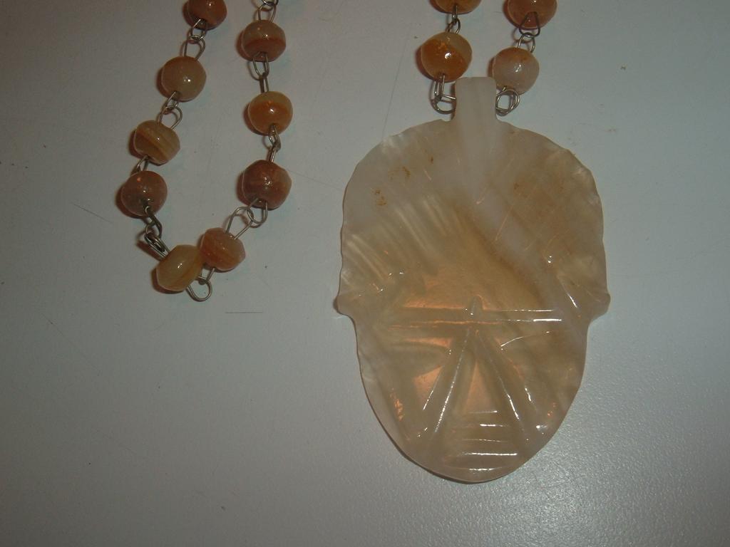 Incredible Beaded Stone Necklace and Carved Pendant Incredible Beaded Stone Necklace and Carved Pendant
