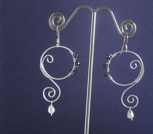 Hematite, Fresh Water Pearl and Sterling Silver Earrings Hematite, Fresh Water Pearl and Sterling Silver Earrings