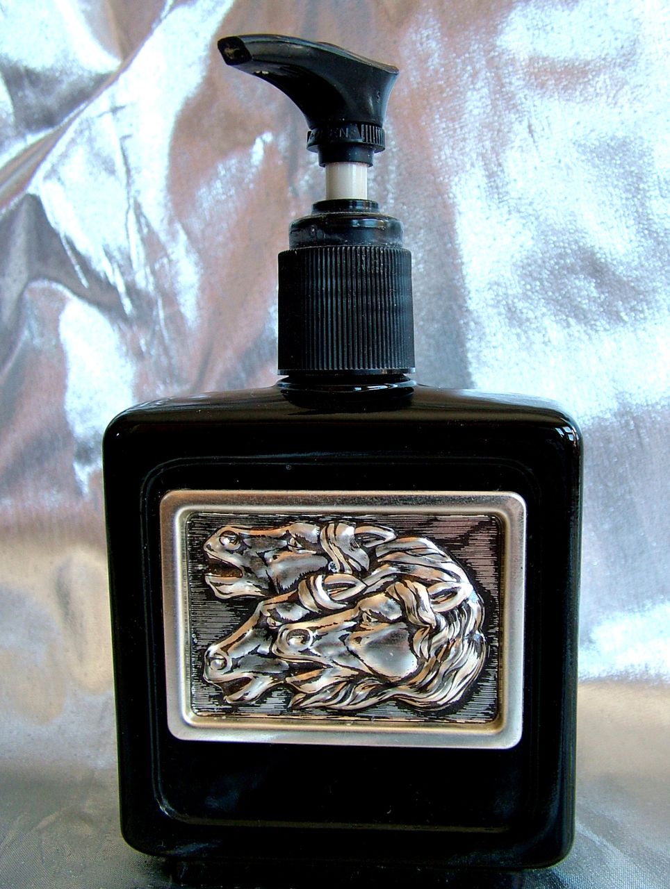 Vintage black lotion dispenser with silver horses Vintage black lotion dispenser with silver horses